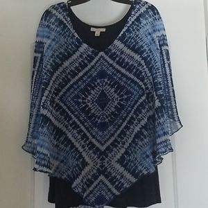 Flowy top with fitted shell underneath